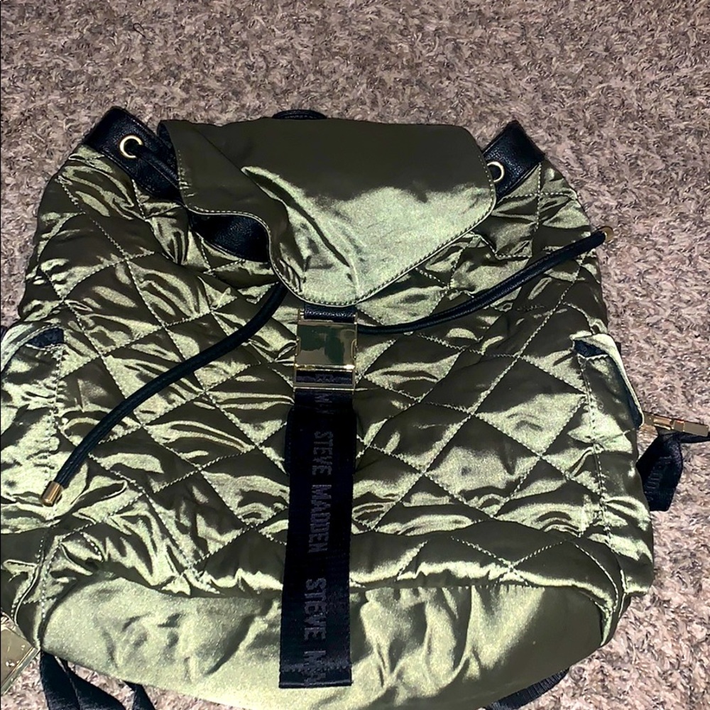 Large army green Steve Madden backpack.